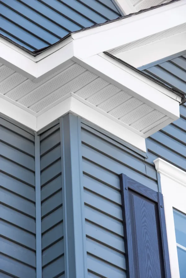 New blue siding installed on a residential home